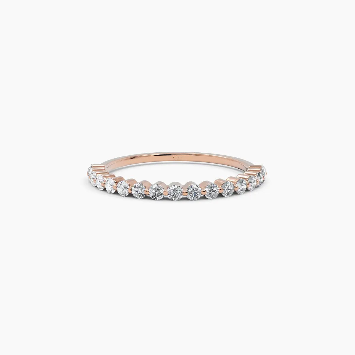 rose gold diamond eternity band made from 14k rose gold, blending warm hues with dazzling diamonds for a modern yet classic style
