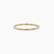 yellow gold thin stackable ring in 14k solid gold, featuring a sleek and minimalist band for effortless everyday wear
