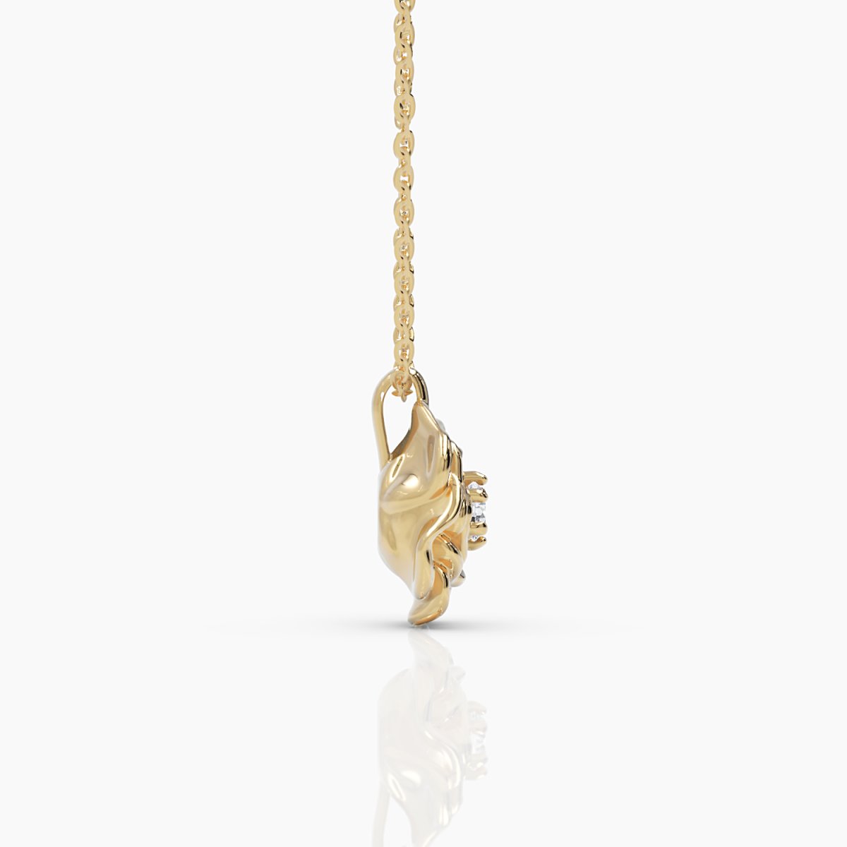 Side profile of the 14k yellow gold rose pendant, highlighting its sculpted flower shape and prong-set diamond.