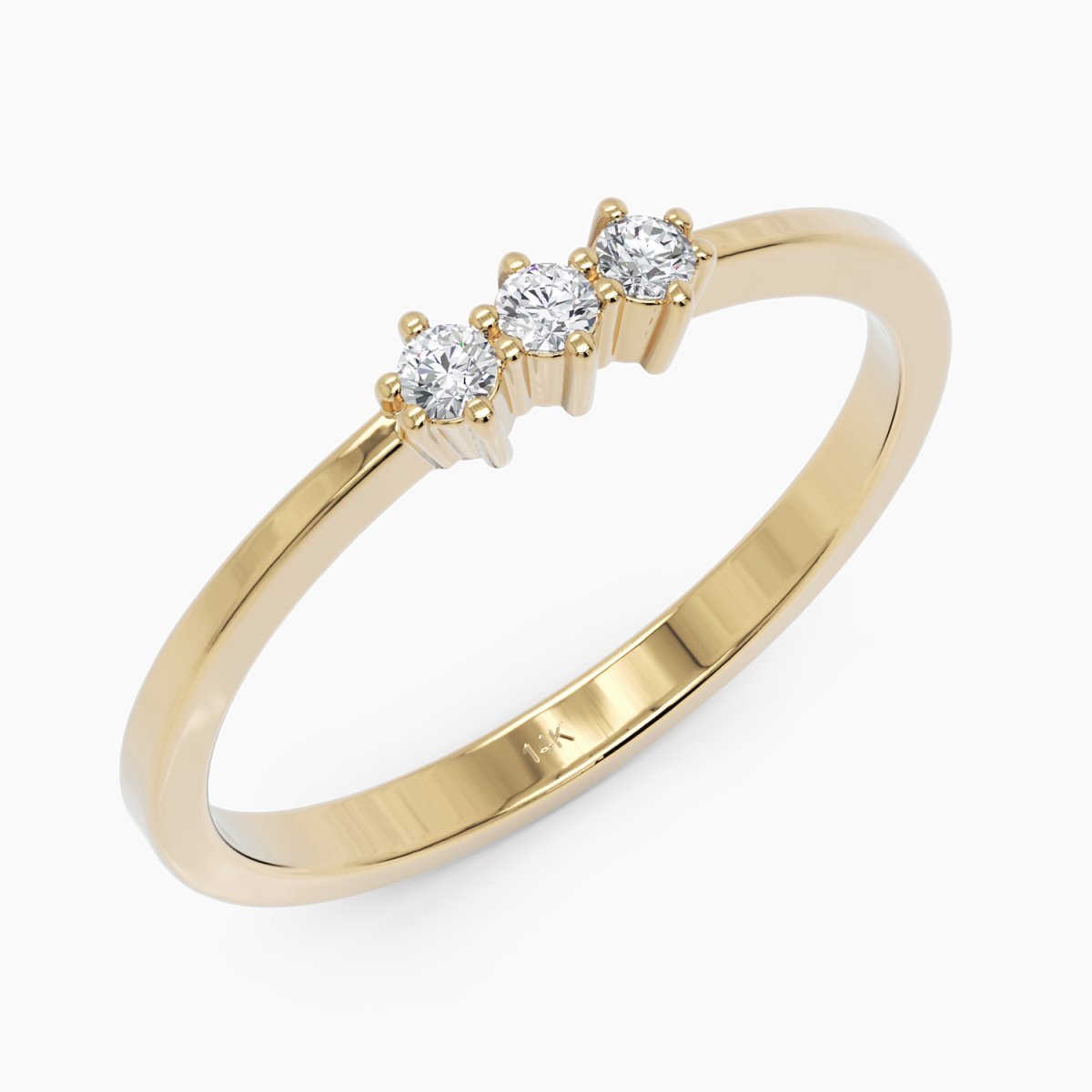 14k yellow gold three-stone diamond ring shown at an angle, highlighting its smooth gold band and prong-set round diamonds for a refined and sophisticated look.