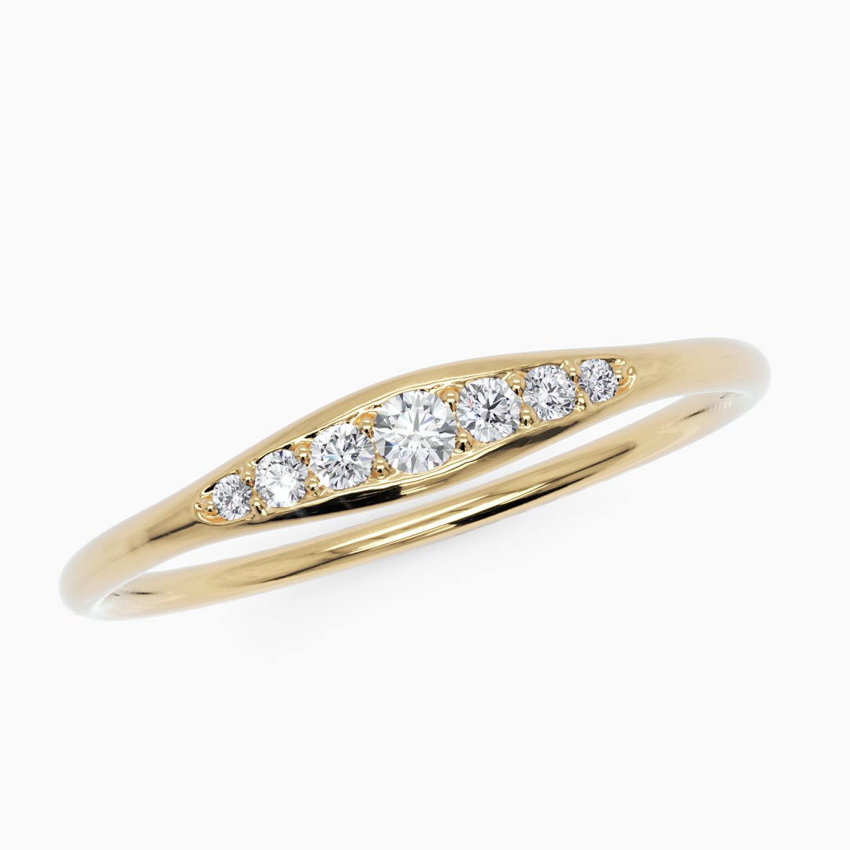 top down side view of the seven stone diamond band in yellow gold, showcasing the smooth, tapered band and precisely set diamonds