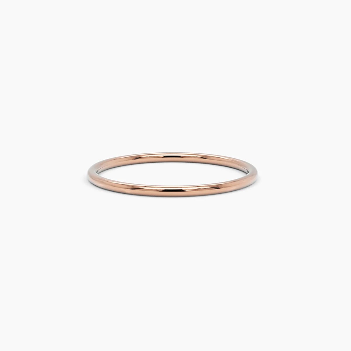 rose gold thin stackable ring in 14k rose gold, showcasing a warm-toned, ultra-thin band perfect for layering or wearing solo
