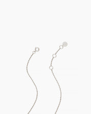 Close view of the solid white gold extender chain and clasp