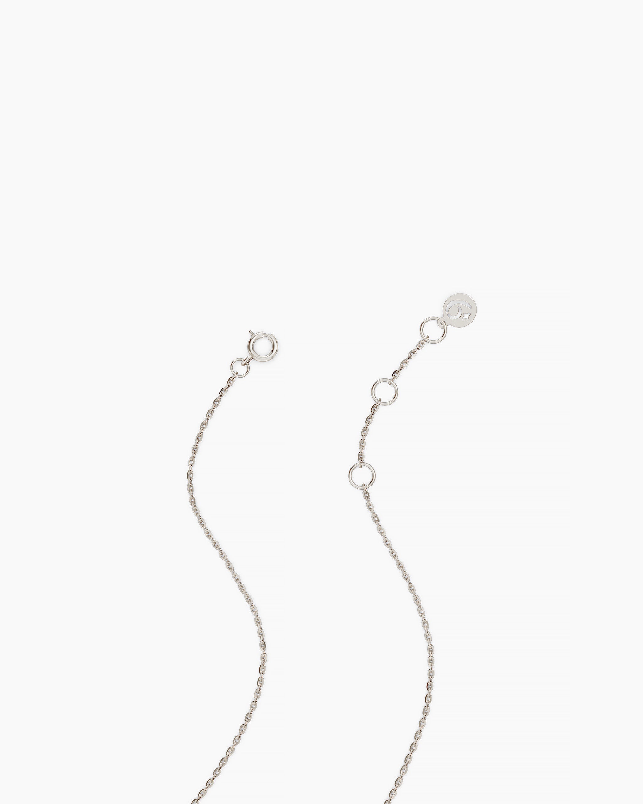 Close view of the solid white gold extender chain and clasp