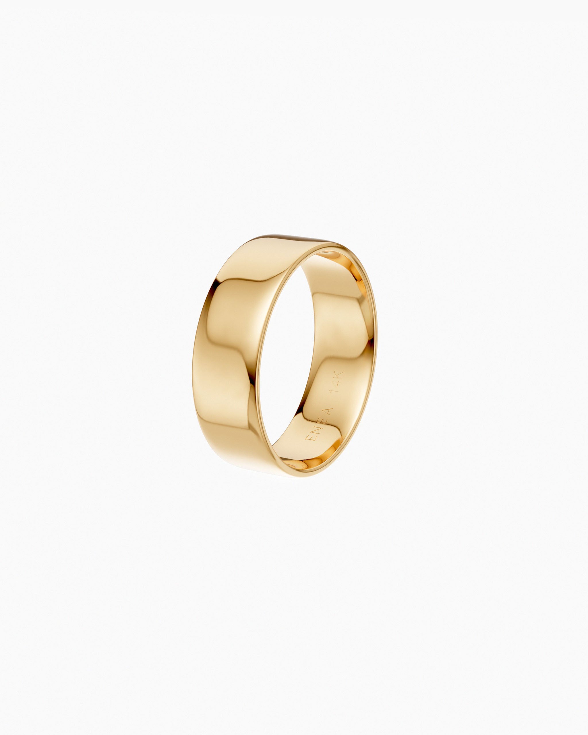 Side view of the Cigar Band Ring hadcrafted in solid yellow gold by ENEA Studio