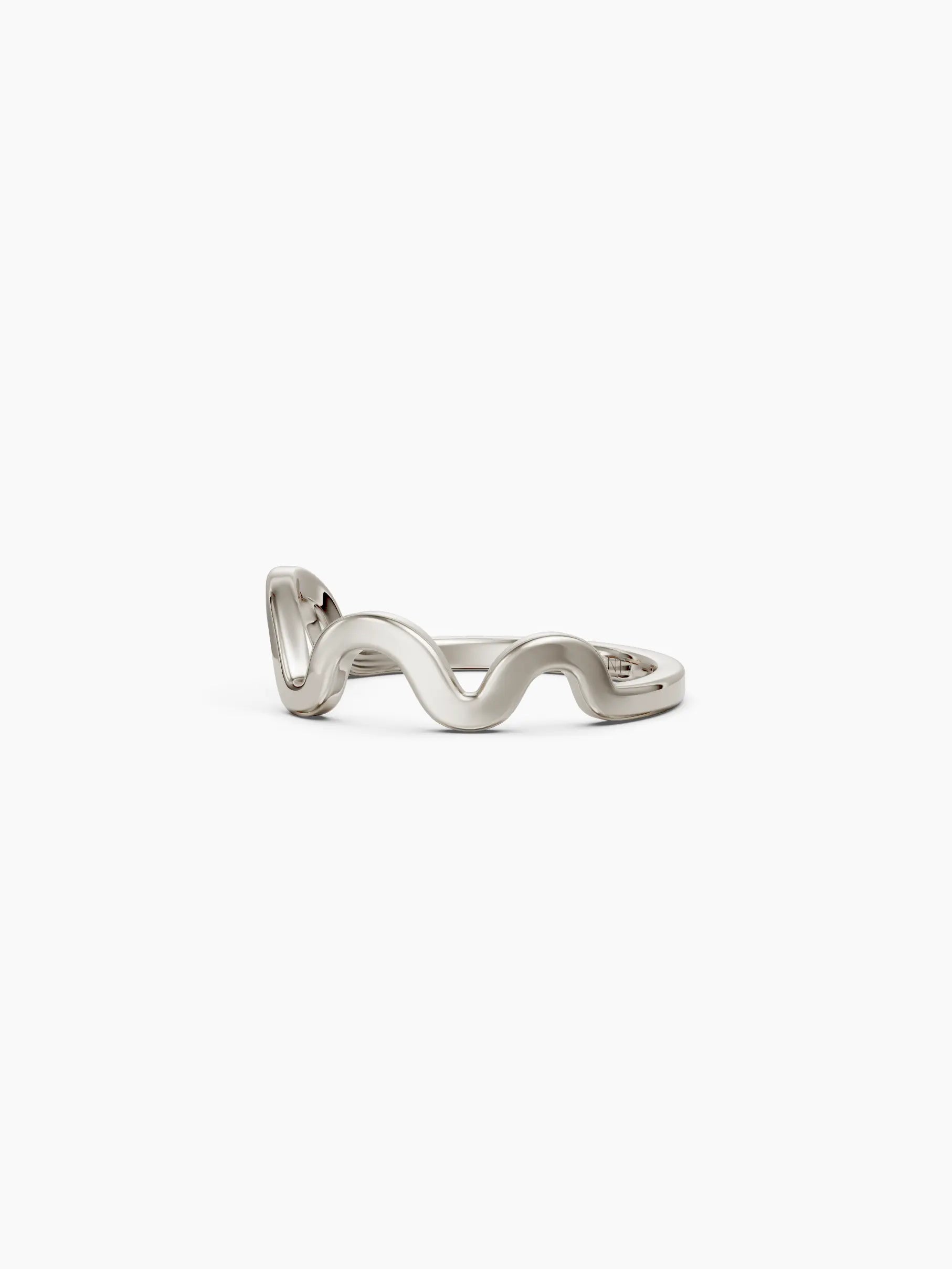 Side view of a 14k white gold wavy band ring with a sculptural flowing design on a white background. Enea Studio