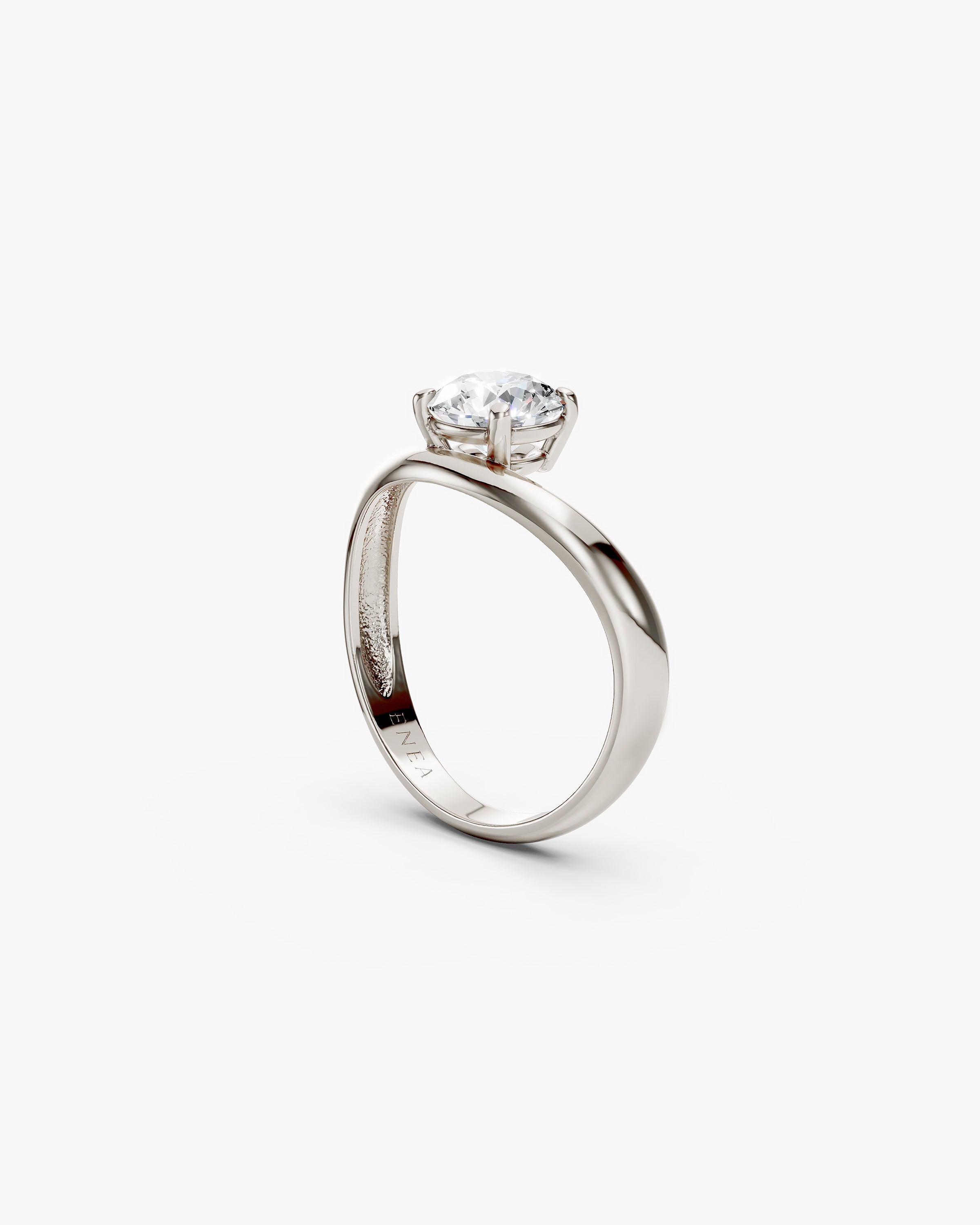 solid white gold kyma solitaire band ring with wave design side view with ENEA hallmarked on the inside of the band