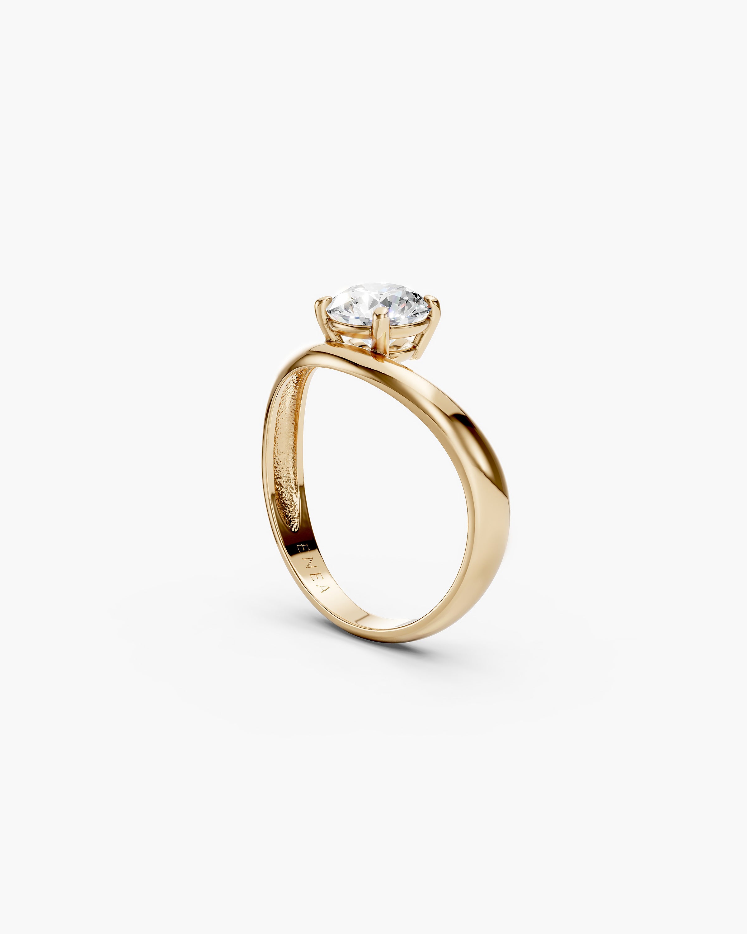 solid yellow gold kyma solitaire band ring with wave design side view with ENEA hallmarked on the inside of the band