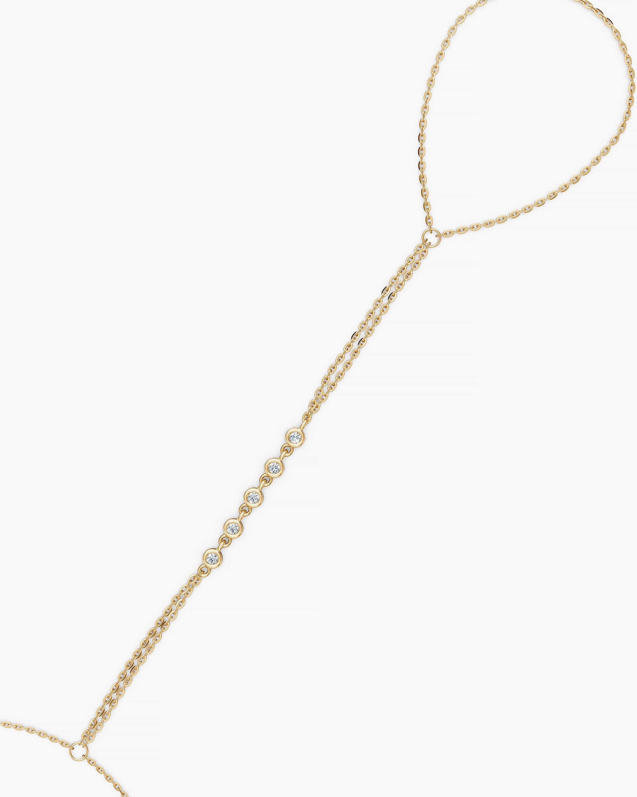 Close up of the double strand chain and five bezel set diamonds, 14k yellow gold hand chain, ENEA Studio