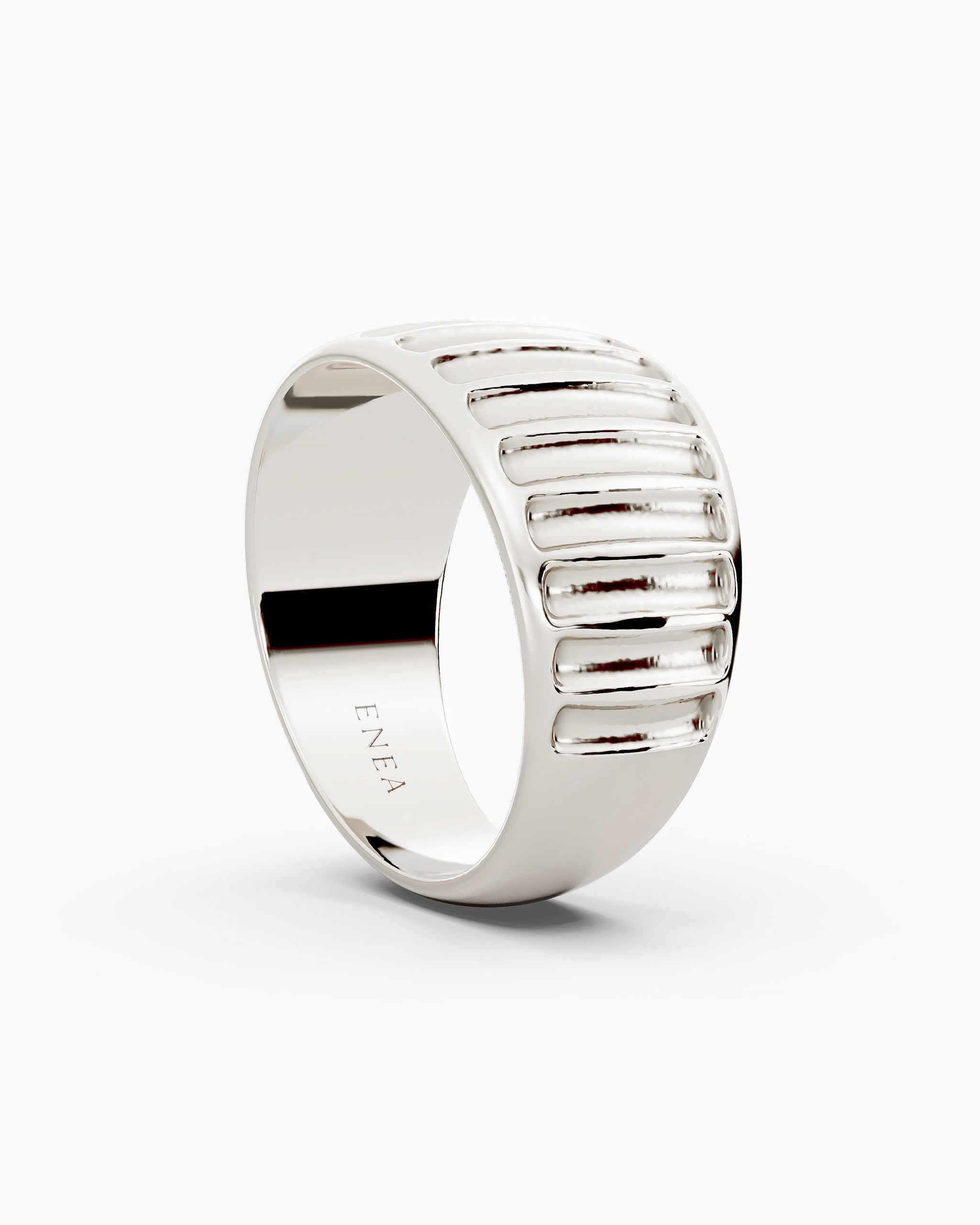 Side view of the Kion Ribbed Dome Ring with ENEA hallmarked on the inside of the band