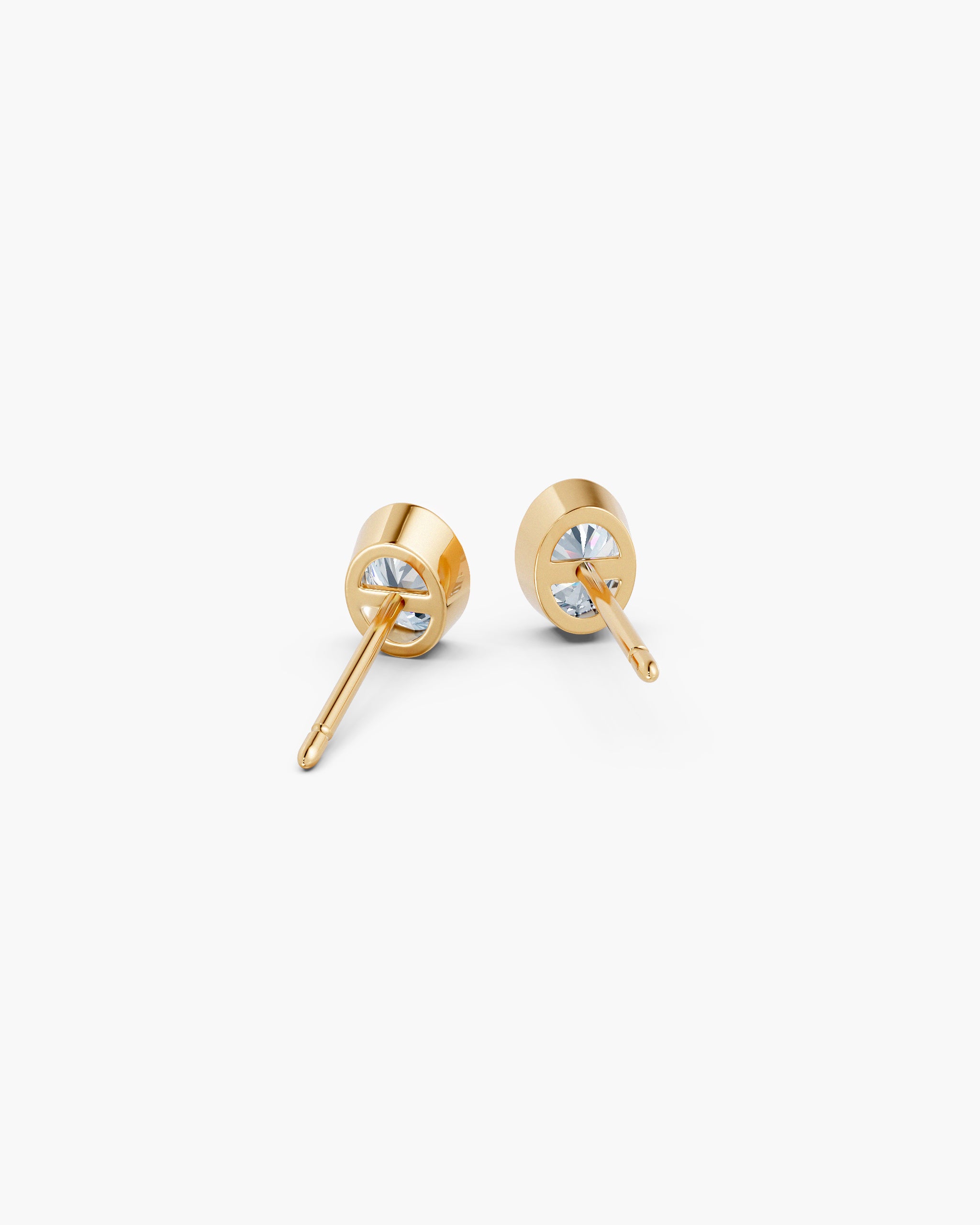 Back of the oval bezel diamond stud in 14k yellow gold with open window and post, ENEA Studio
