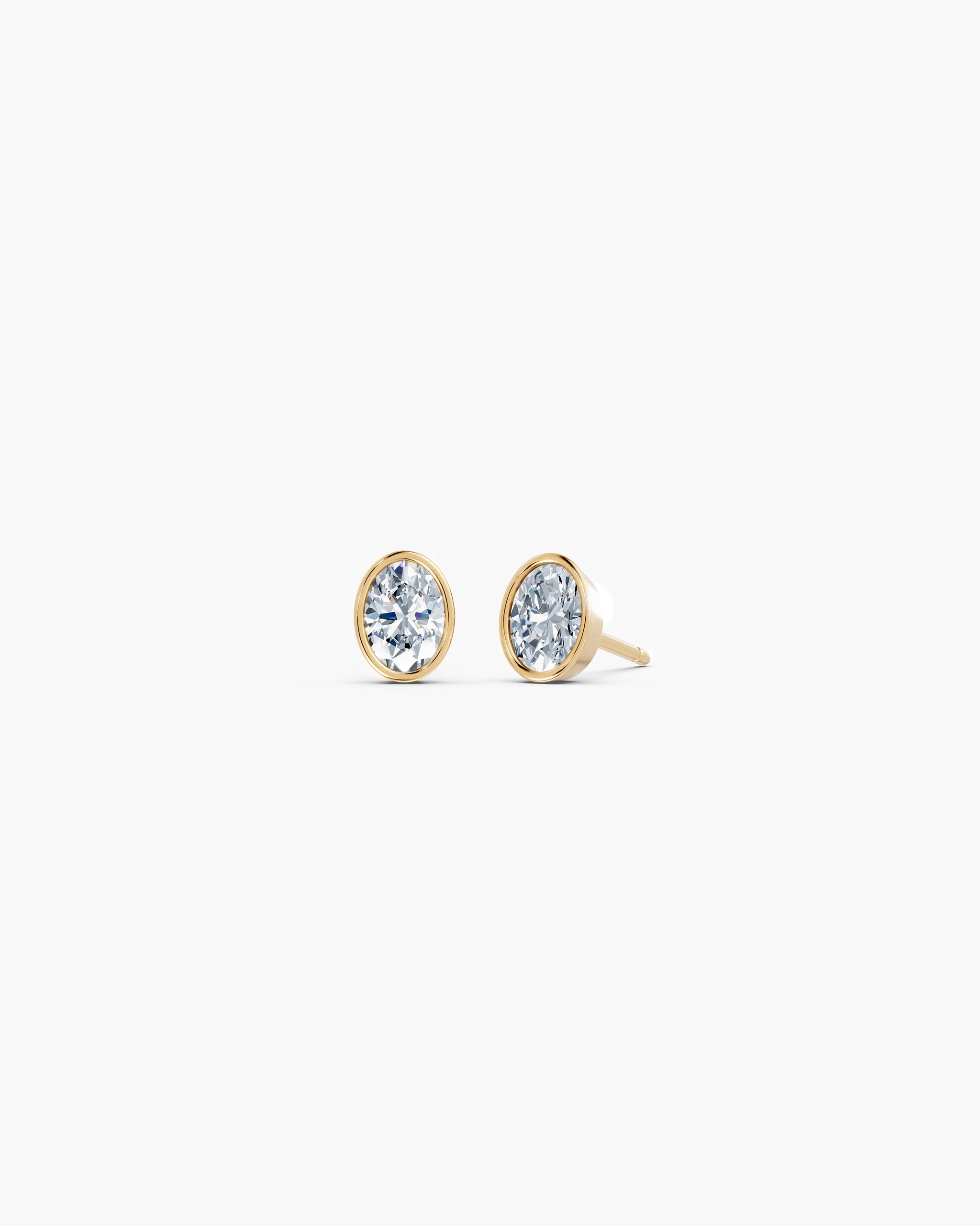 Oval bezel lab diamond stud earrings in 14k yellow gold, 0.25 ct each, ENEA Studio
