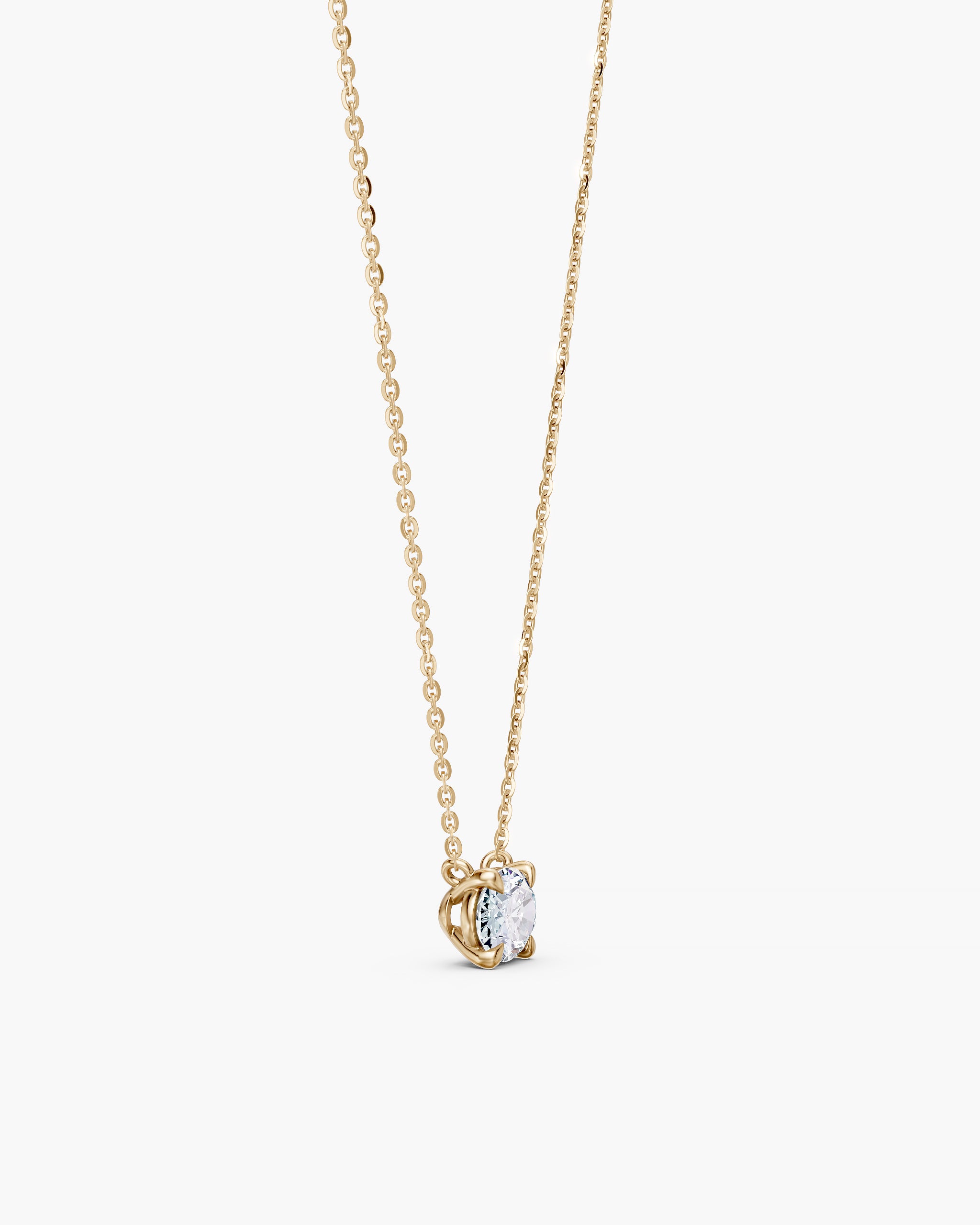 Side view of the four claw oval diamond setting in 14k yellow gold, ENEA Studio