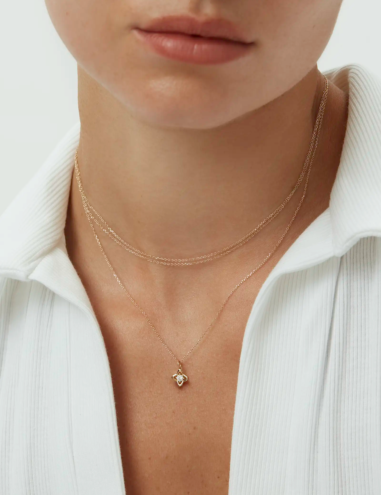 ENEA_PetalDiamondNecklace_OnModel_YG_1.webp