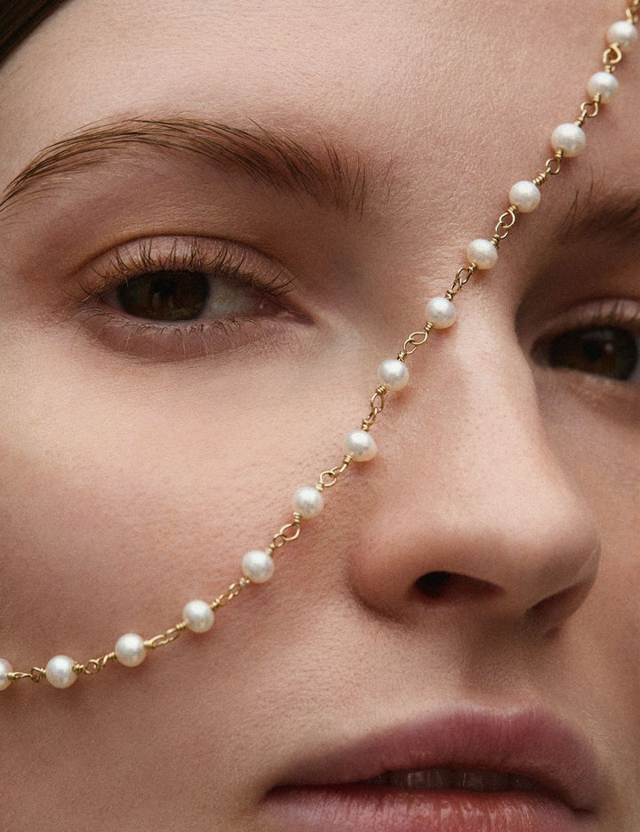 Pearl chain across the face, ENEA Studio