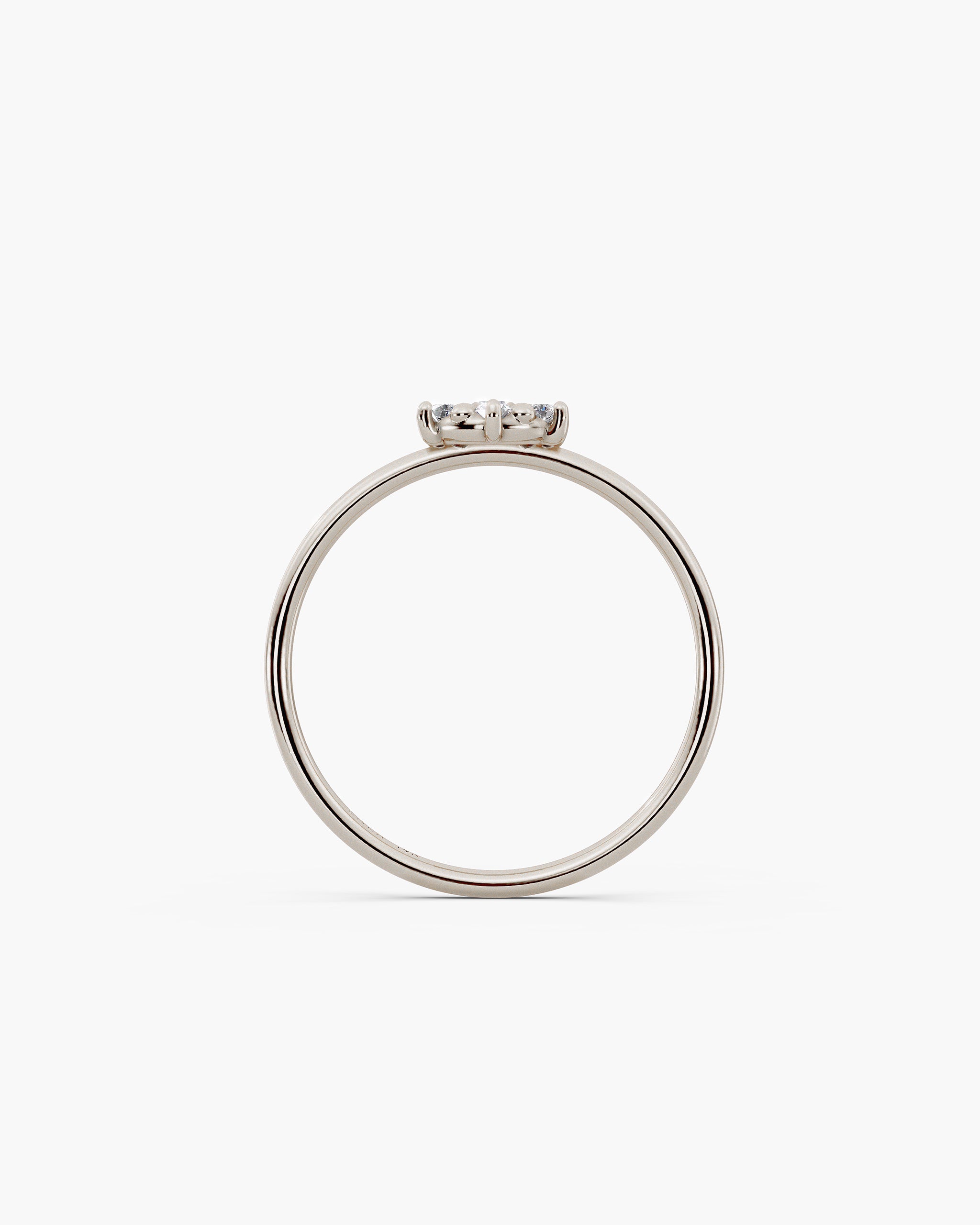 Through finger view of the Selas Diamond Cluster Ring in 14k white gold, the cluster sitting 2.7mm above the 1.2mm band. ENEA Studio