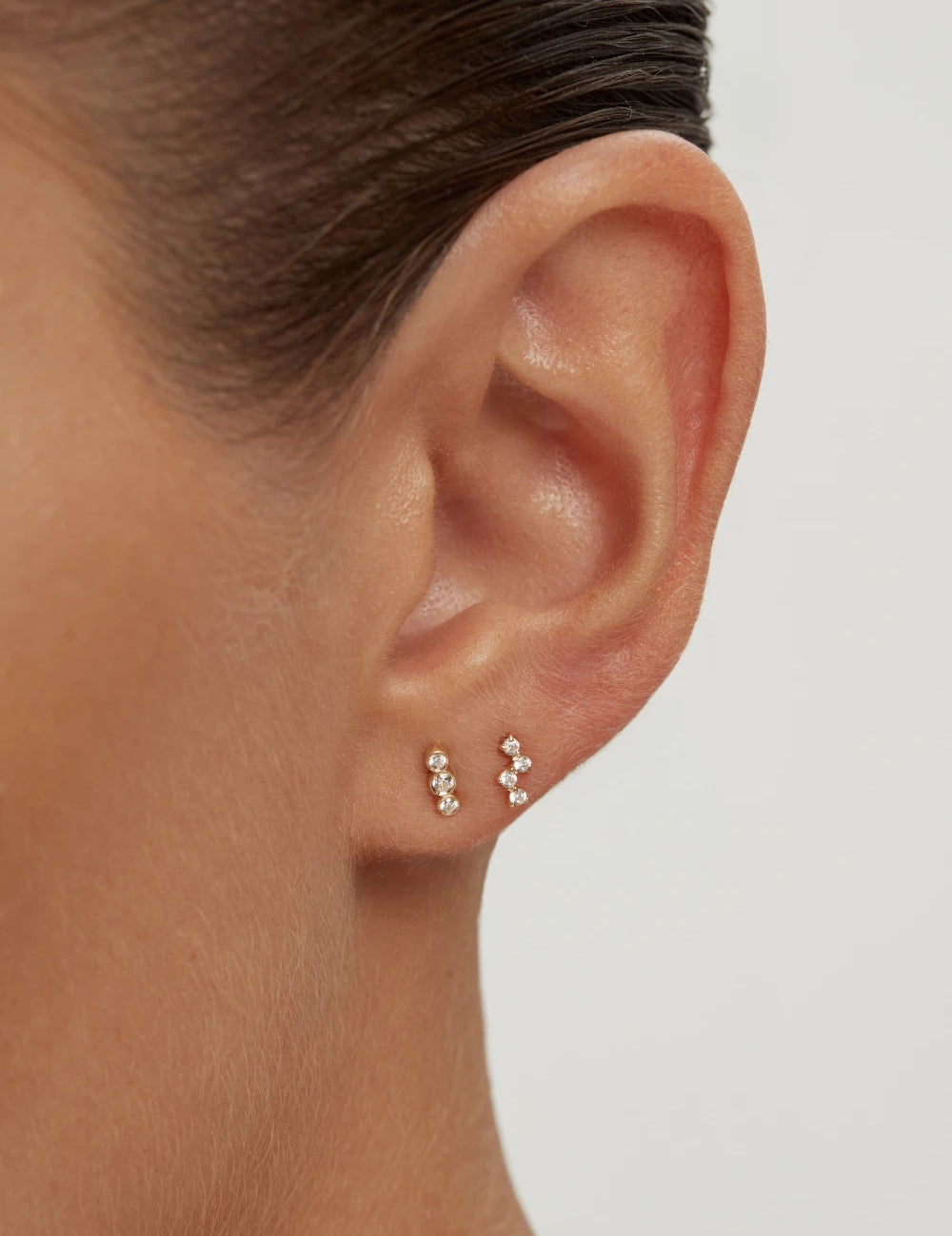 ENEA_TinyTrioStudEarrings_OnModel_PDP3.webp