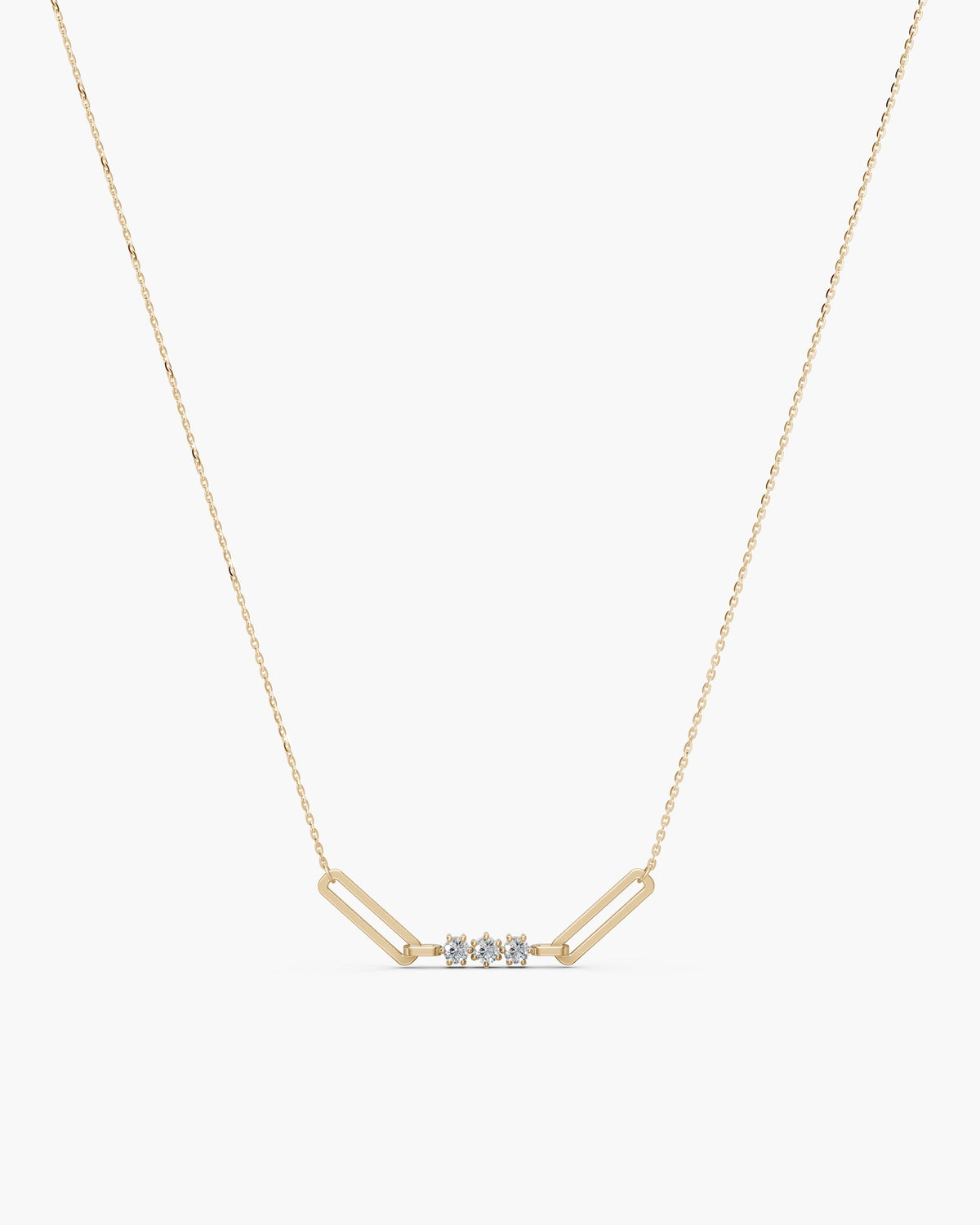 Tria diamond paperclip necklace in 14k yellow gold with three prong set diamonds between two paperclip links, ENEA Studio