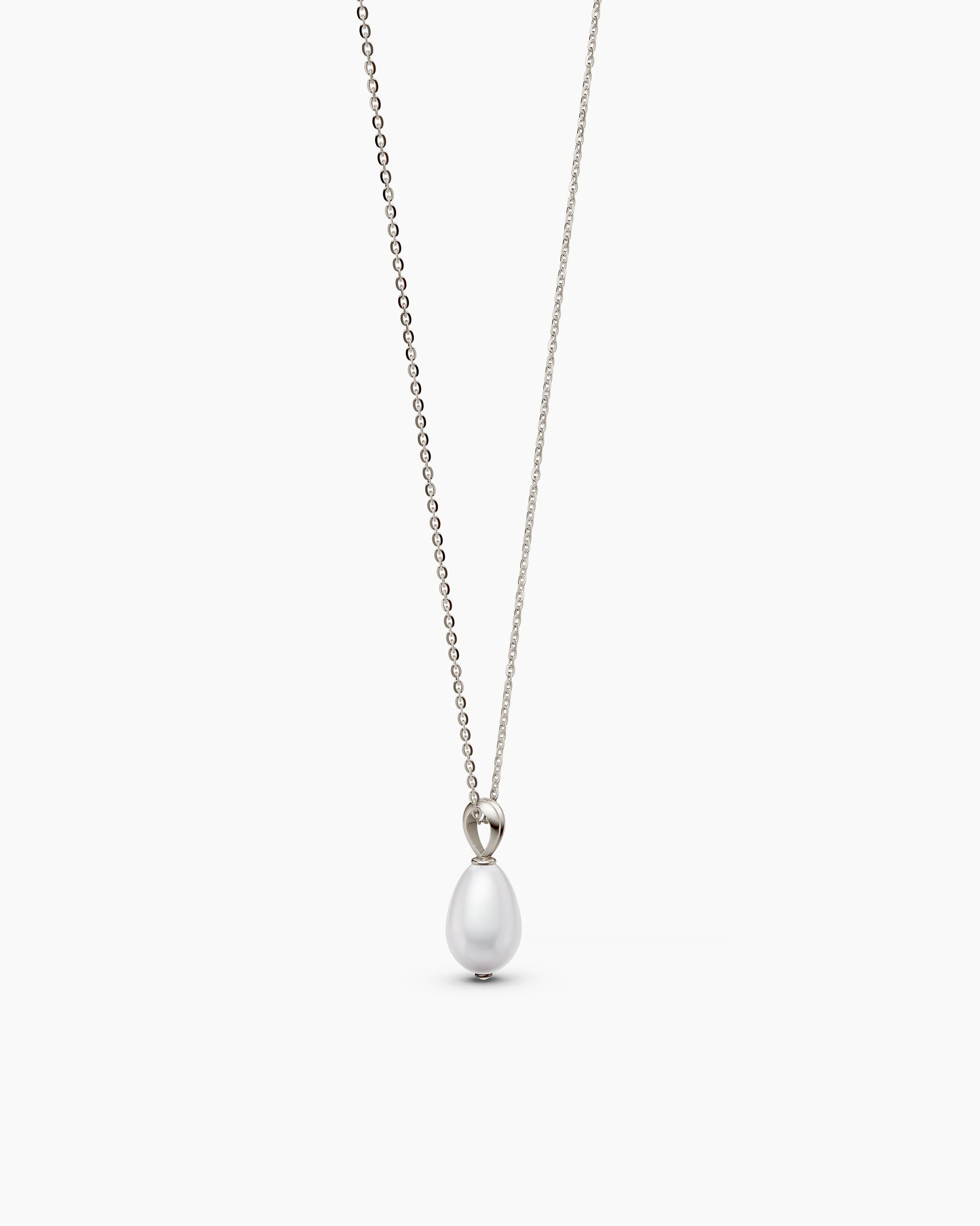 Side view of a sterling silver freshwater pearl necklace with a single baroque pearl