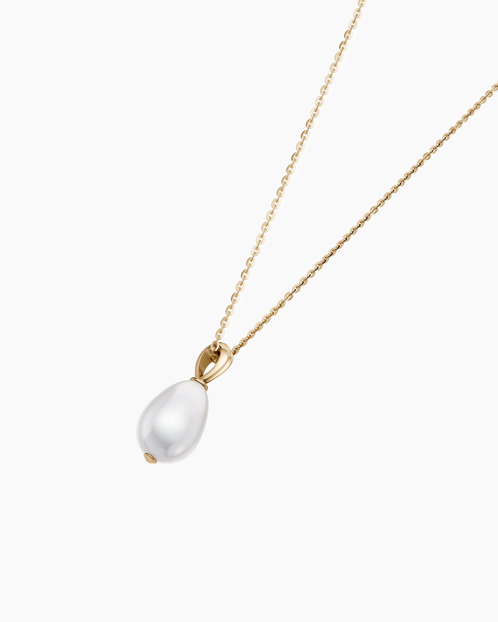 Gold pearl necklace detail showing 14k solid gold bail and 1mm cable chain