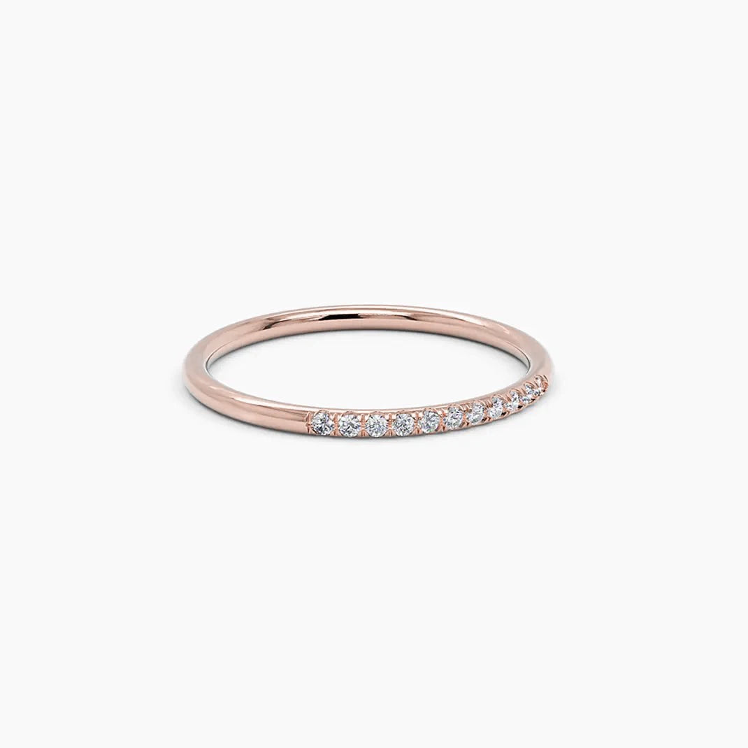 14k rose gold thin pave diamond stacking band ring, side angle product shot on white background