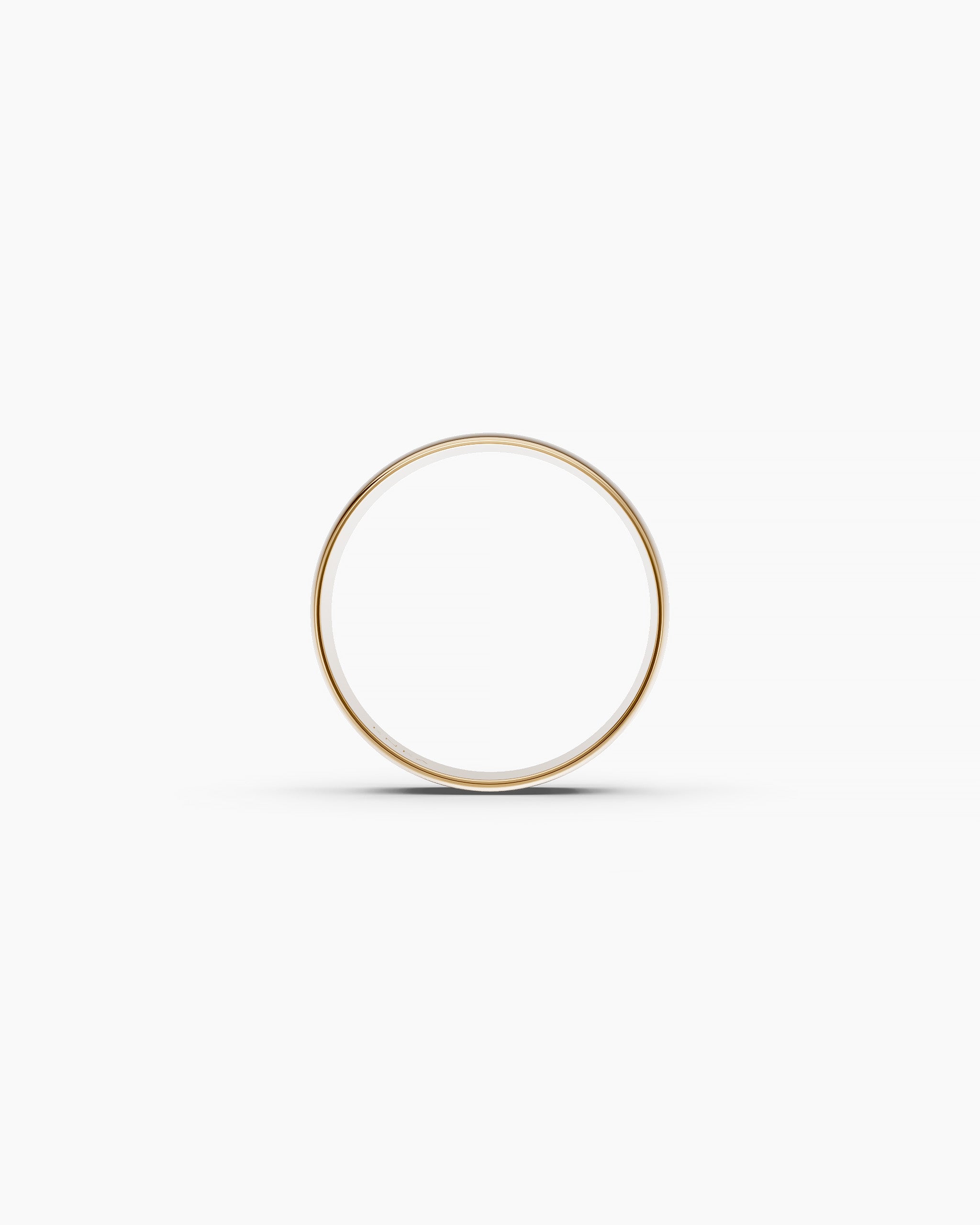 Upper view of the Kion Classic Dome Ring in yellow gold showing the band width on a neutral background