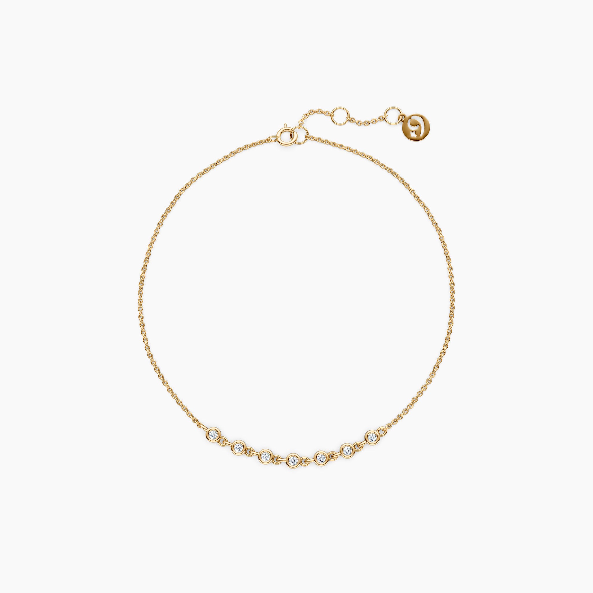 solid gold link tennis diamond bracelet with bezel set diamonds on white background