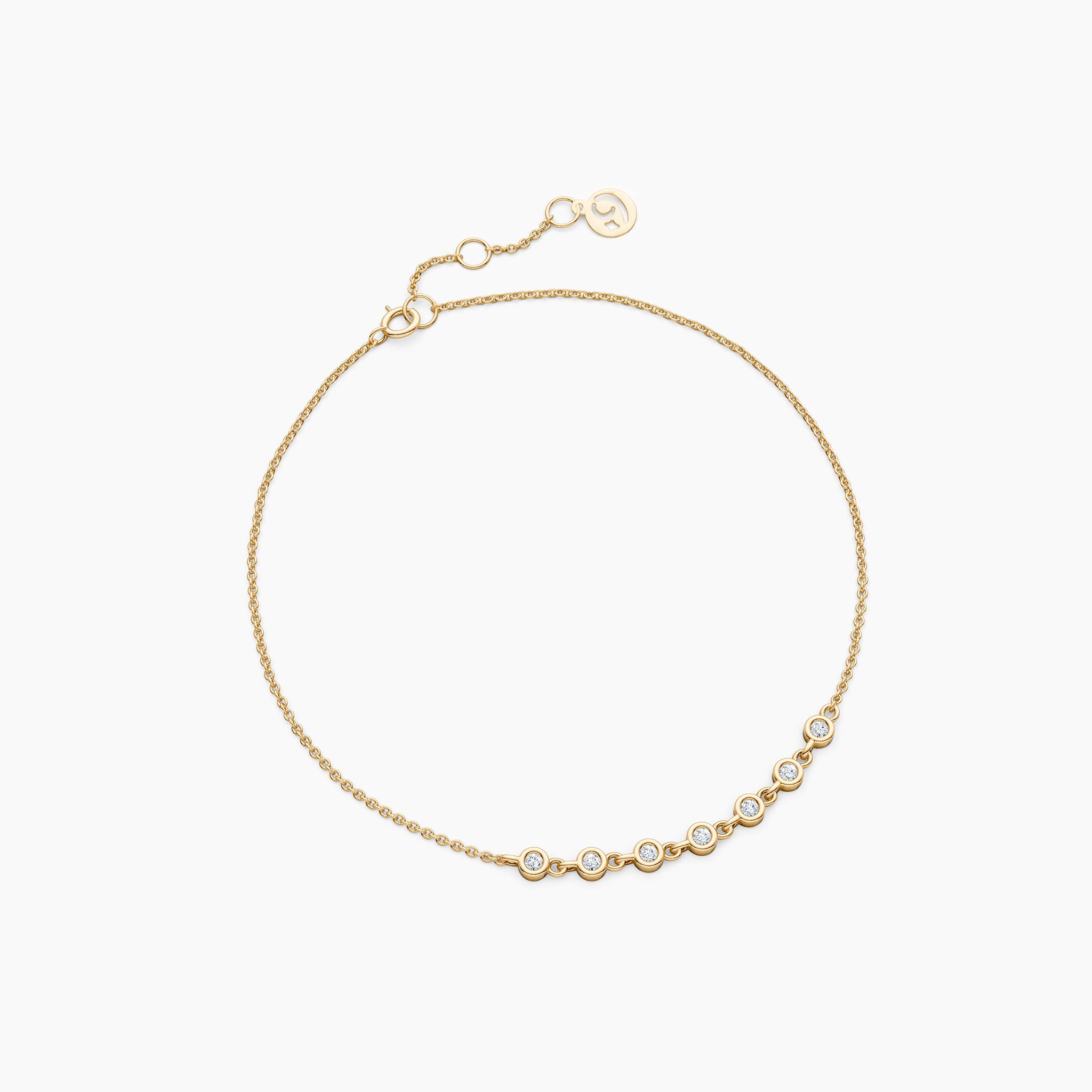 solid gold link tennis diamond bracelet close up showing clasp and bezel set diamonds on white background