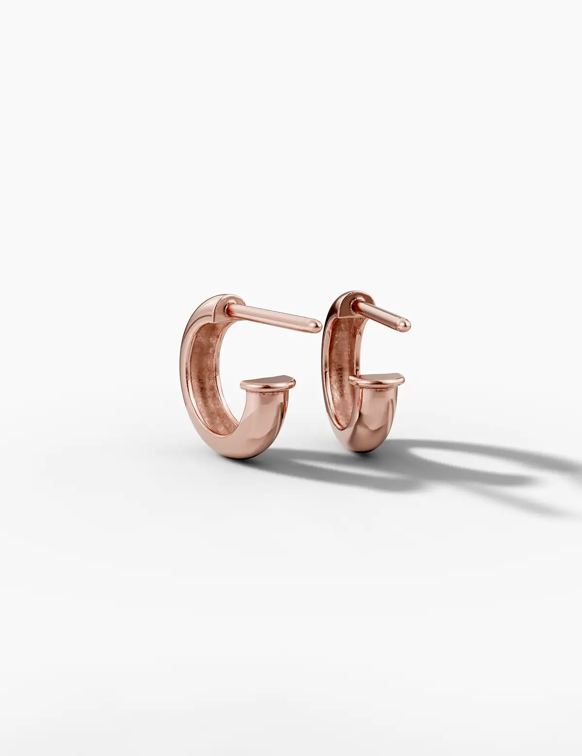 14k rose gold petite stud hoop earrings back view showing push back closure and polished finish on white background