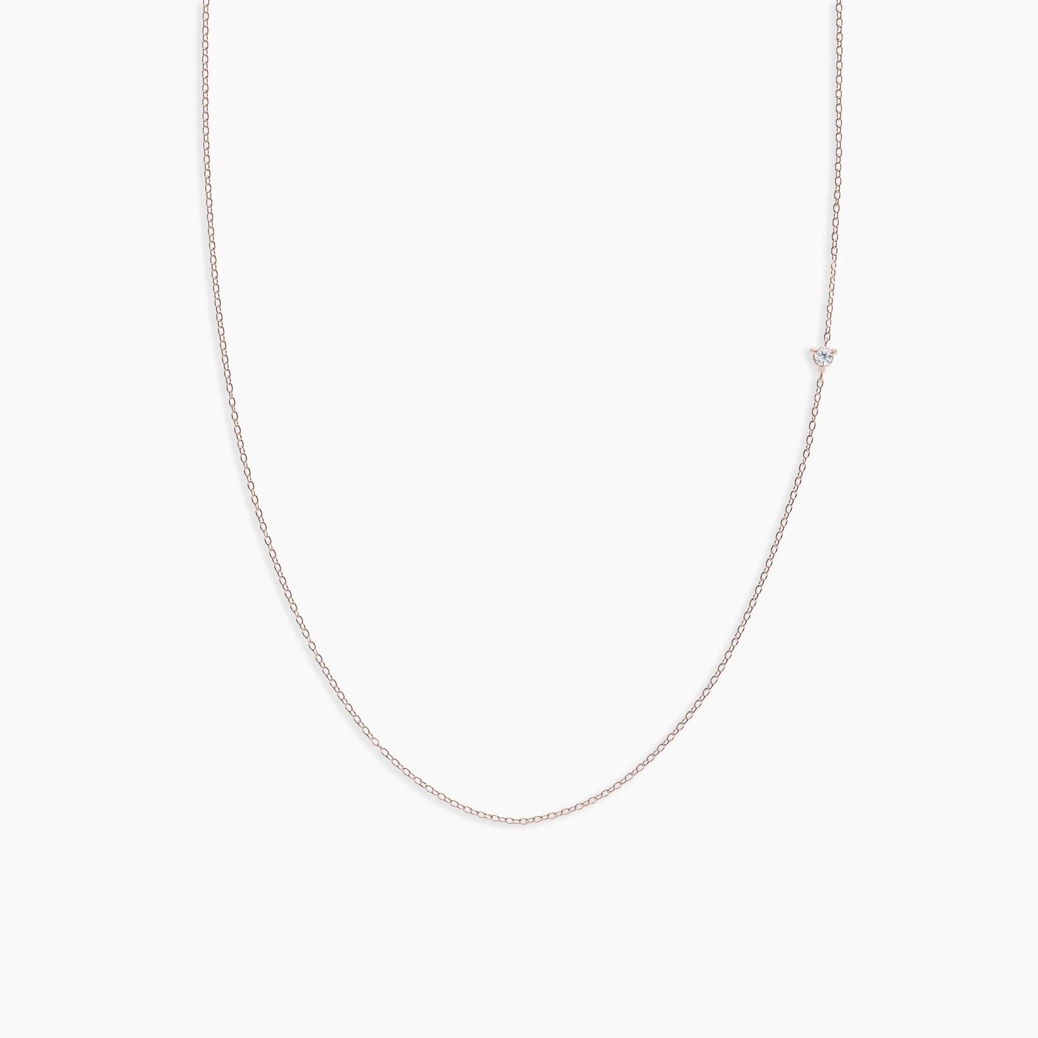 Rose Gold chain diamond choker necklace on a light gray background
