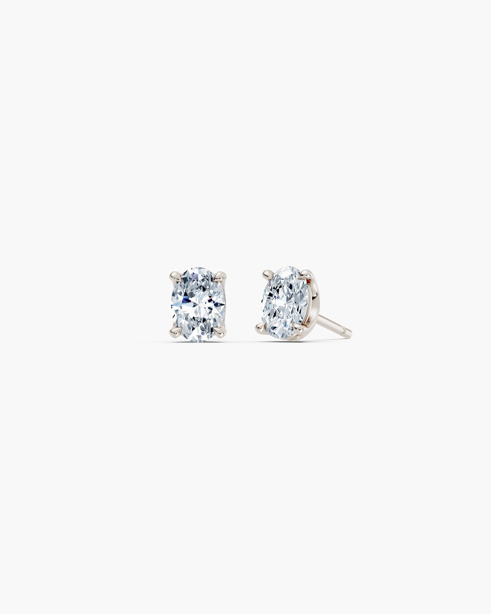 Oval lab diamond stud earrings in 14k white gold, 0.75 ct each, four prong setting, ENEA Studio