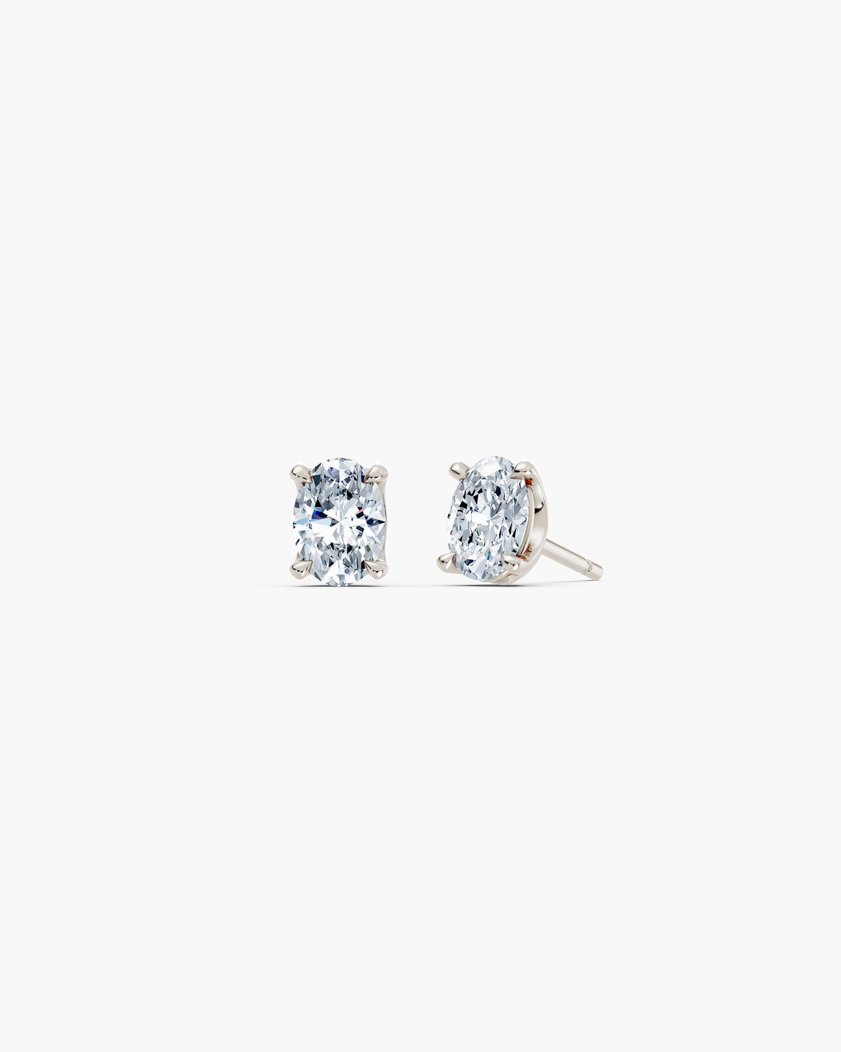 Oval lab diamond stud earrings in 14k white gold, 0.75 ct each, four prong setting, ENEA Studio