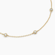 The bracelet wraps delicately around the wrist, diamonds visible from every angle in this lifestyle shot.

