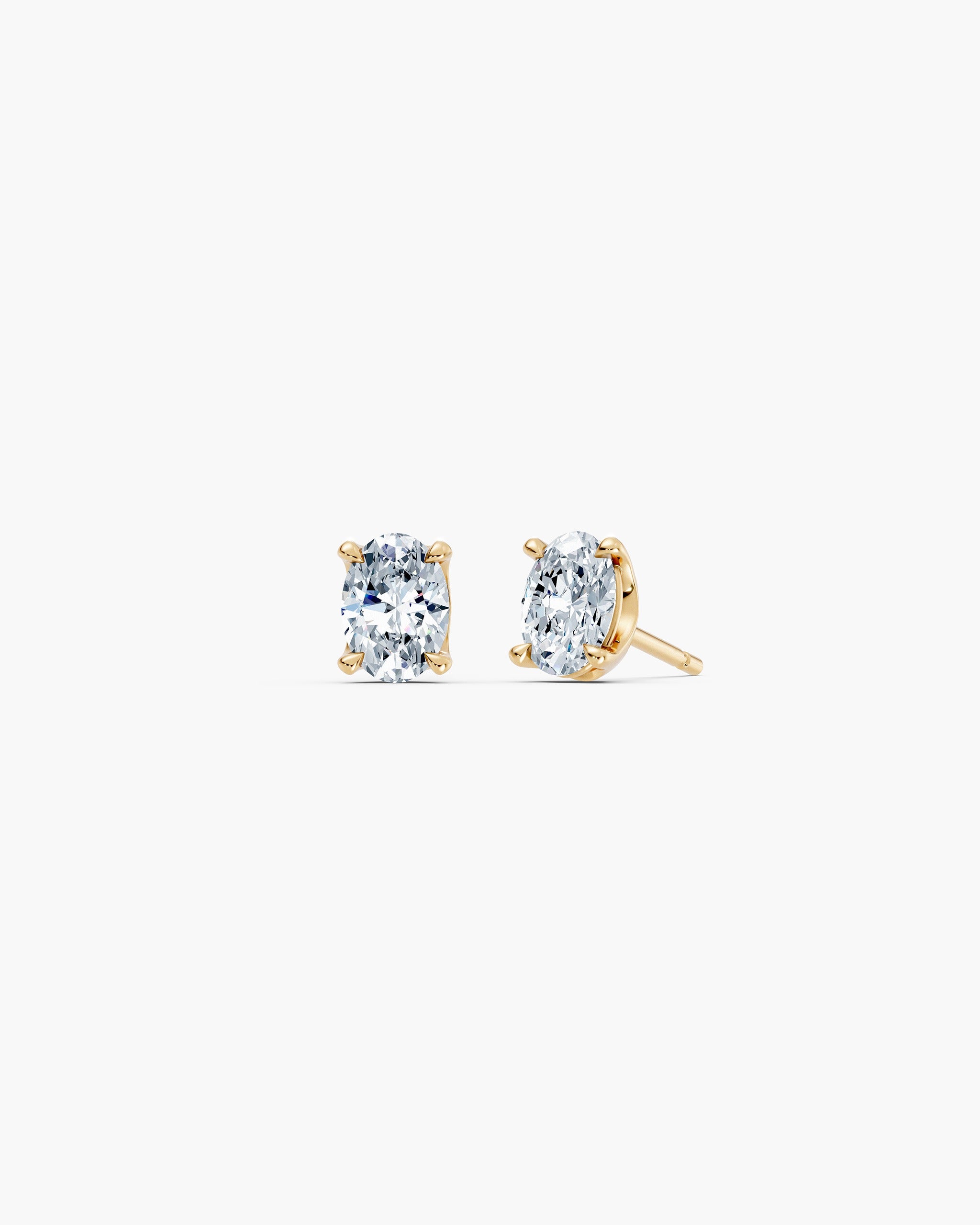 Oval lab diamond stud earrings in 14k yellow gold, 0.75 ct each, four prong setting, ENEA Studio