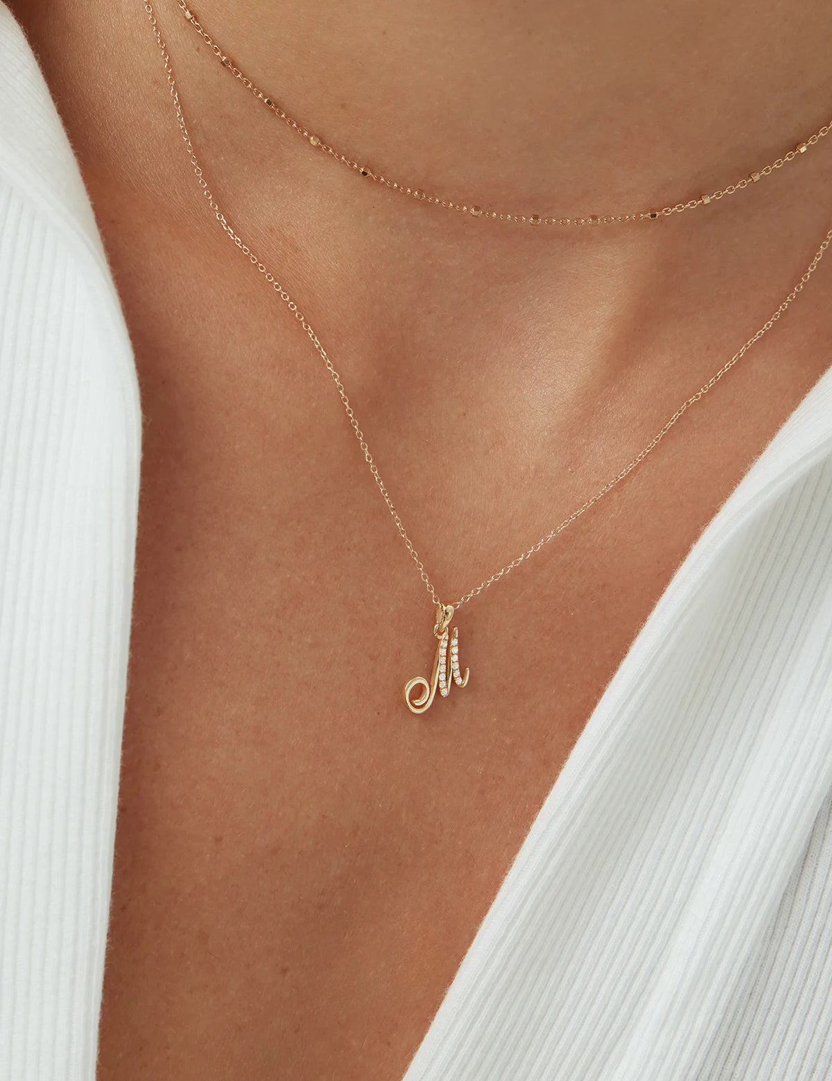 YG_ENEA_PoetryLetterNecklace_OnModel_PDP_2.webp