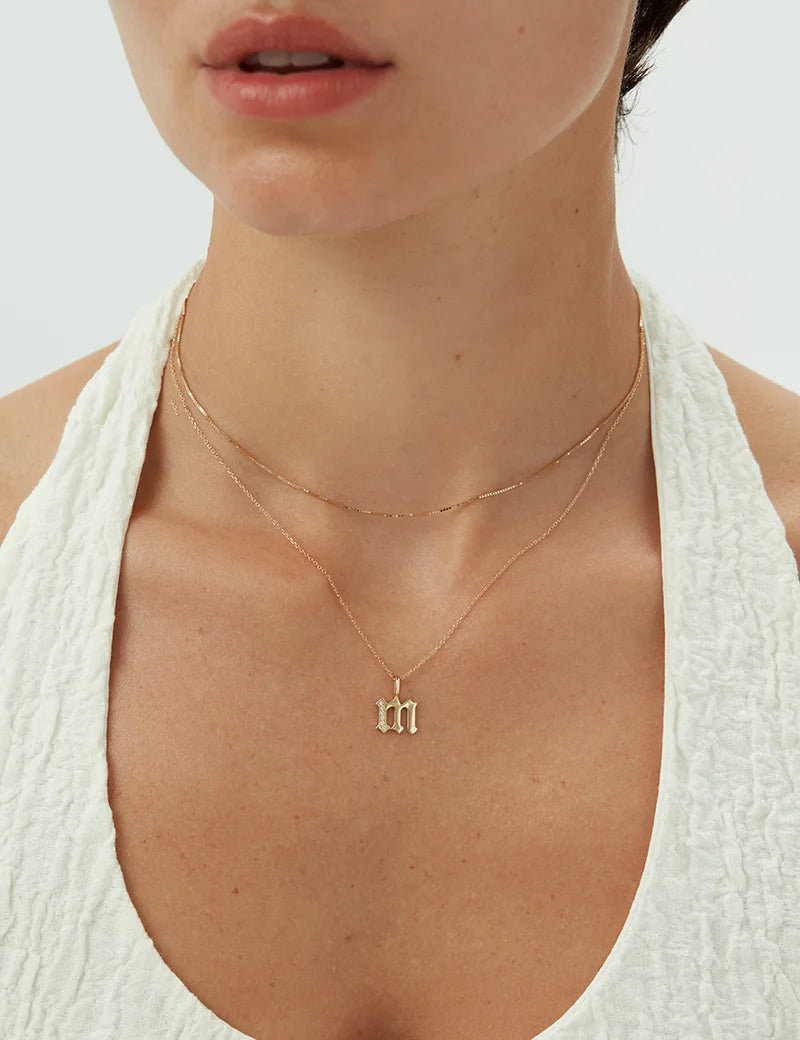 YG_OldEnglishDiamondInitialNecklace_OnModel_PDP_0.webp