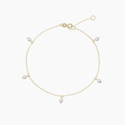14k Gold bracelet with small pearls on a white background