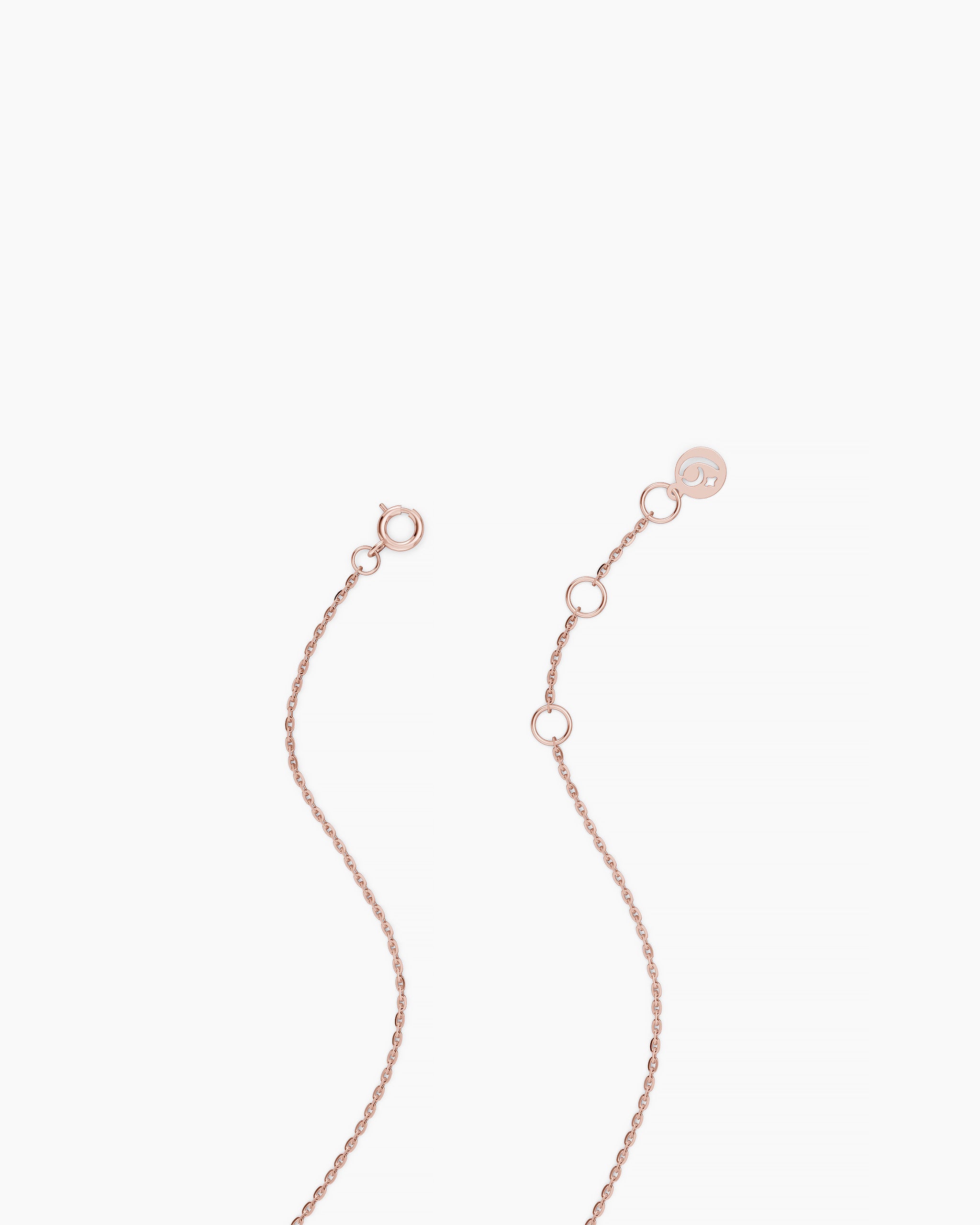 Close view of the solid rose gold extender chain and clasp