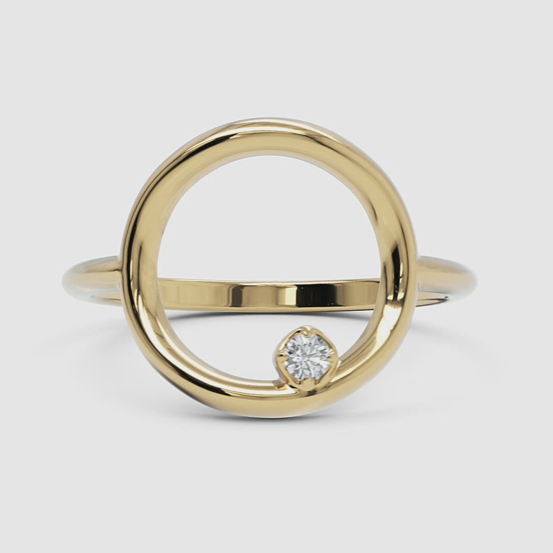 A 360-degree video of the 14k yellow gold open circle diamond ring, smoothly rotating to reveal its polished gold surface and floating diamond detail from all angles.