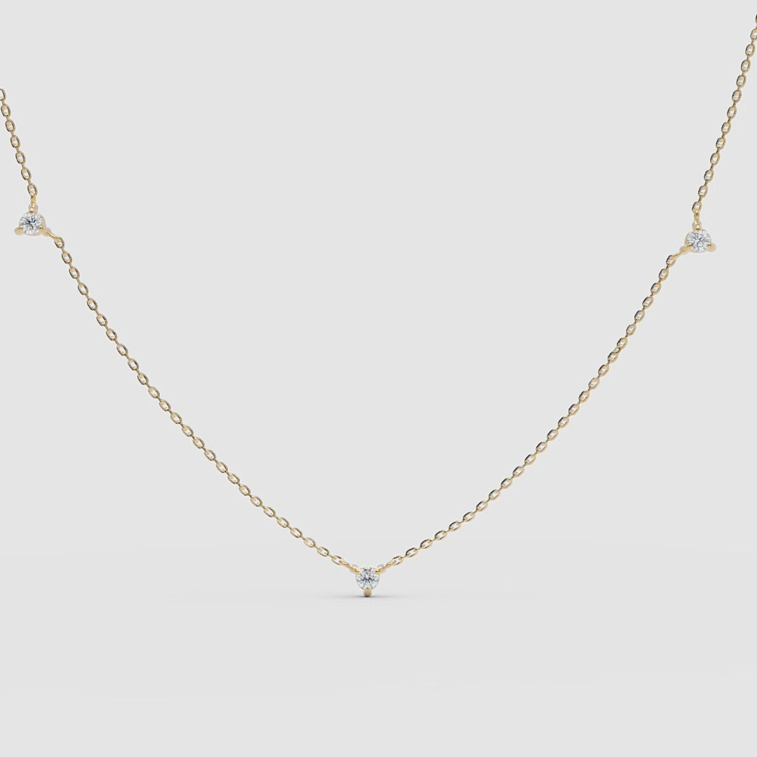 360video showing the 14k yellow gold necklace and the two-sided diamonds 