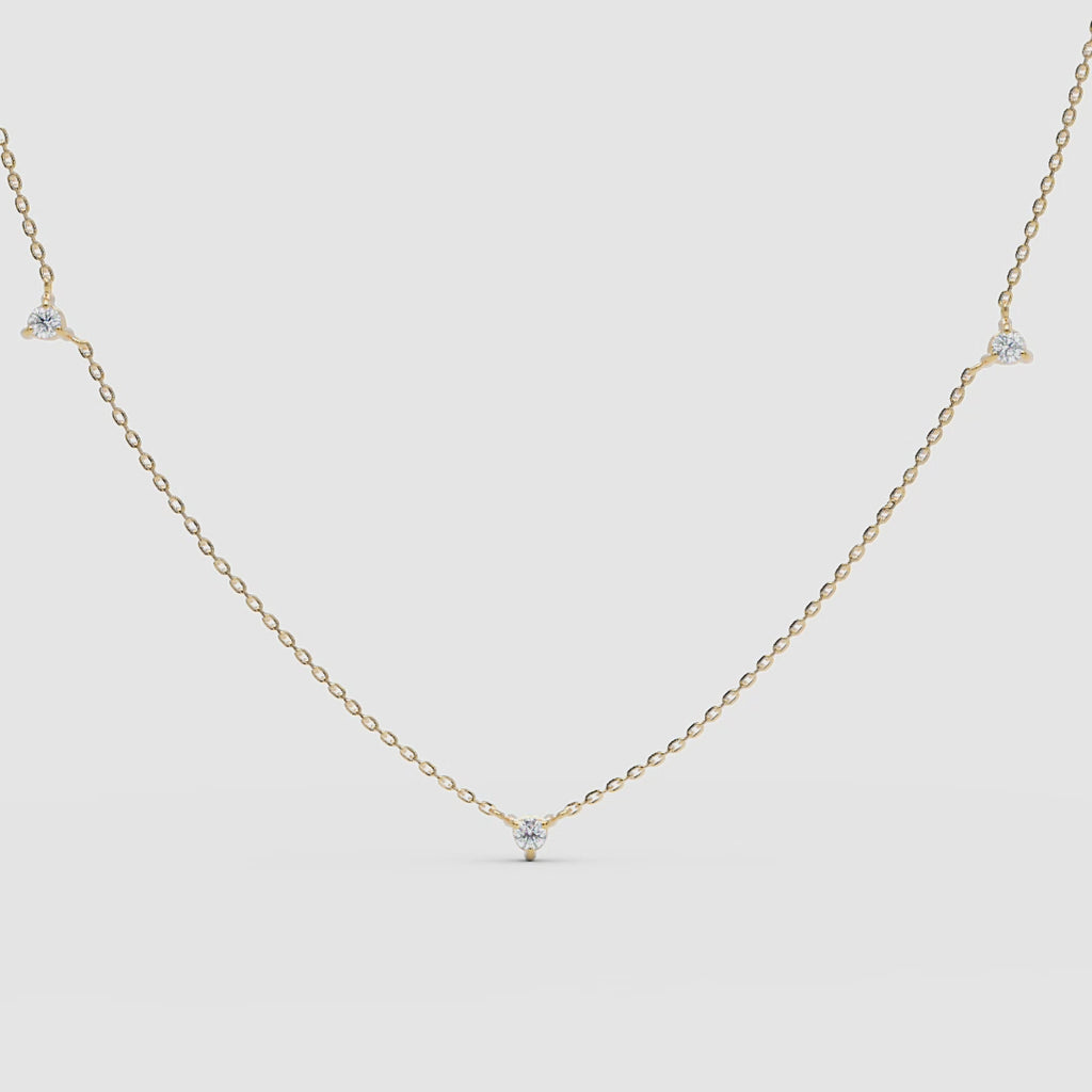 360video showing the 14k yellow gold necklace and the two-sided diamonds 