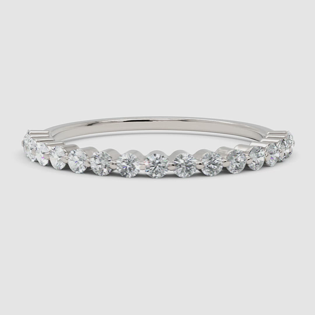 360 video showcasing the white gold diamond eternity band, capturing its light-reflecting brilliance and refined craftsmanship