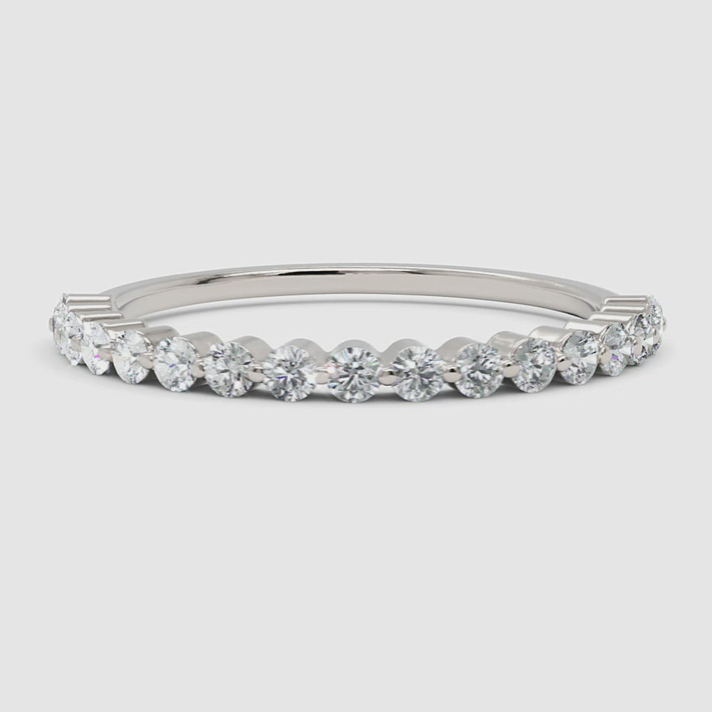 360 video showcasing the white gold diamond eternity band, capturing its light-reflecting brilliance and refined craftsmanship