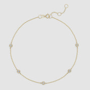Full view of gold station bracelet with clearly visible spring clasp and adjustable extender for fit versatility.

