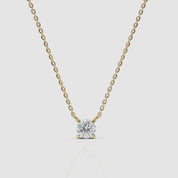 front view of 14k gold diamond solitaire necklace with brilliant round cut, white background, cropped from a 360-degree product video
