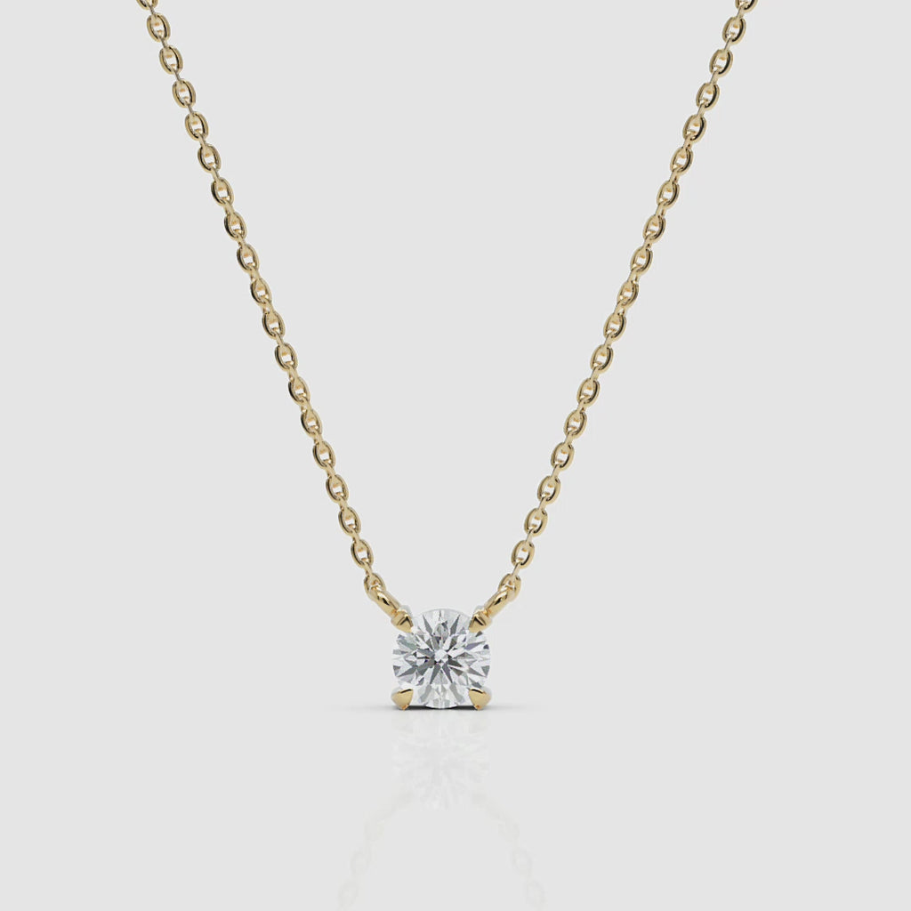 front view of 14k gold diamond solitaire necklace with brilliant round cut, white background, cropped from a 360-degree product video
