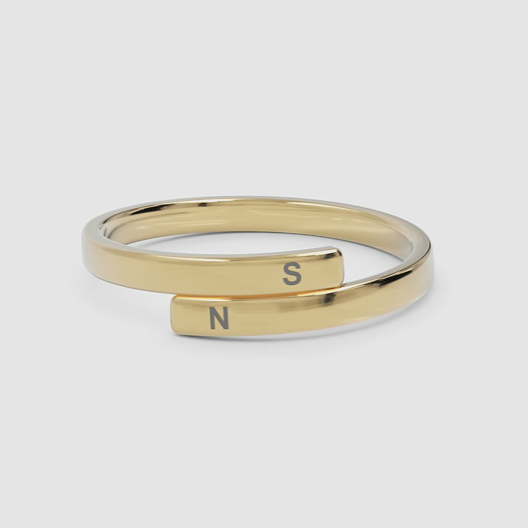 360-degree video of the yellow gold dainty spiral ring, rotating to reveal its sculptural spiral band and smooth, polished surface from every angle