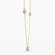 Yellow gold necklace with an adjustable clasp, featuring a close-up of the two-sided diamonds and fine craftsmanship.